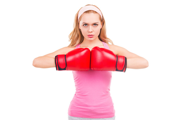 Blond woman in boxing gloves - Foto, afbeelding
