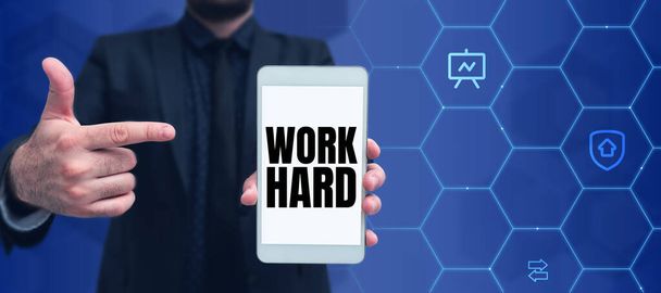 Ручная надпись Work Hard, Business concept Laboring that puts effort into doing and completing tasks - Фото, изображение