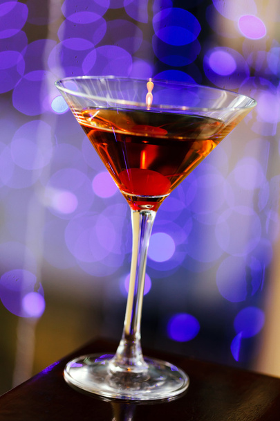 Cocktail on blurry background - Фото, изображение