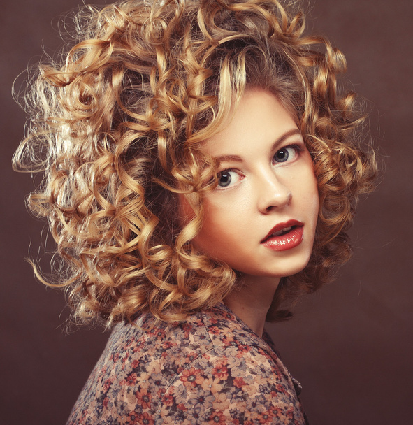 beautiful woman with curly hair - Фото, зображення