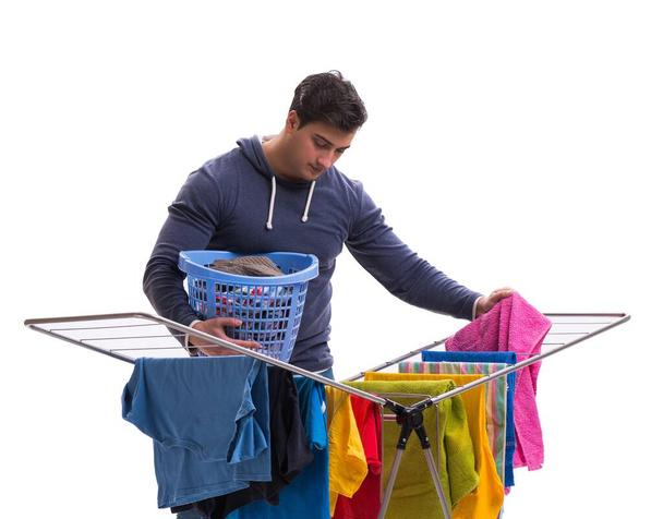 O marido homem fazendo lavanderia isolada em branco - Foto, Imagem