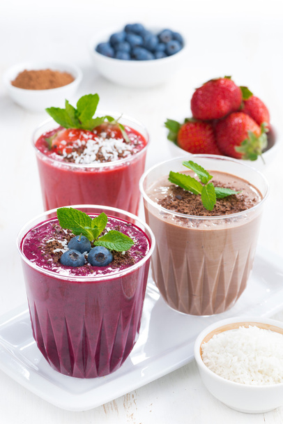 Assorted milkshakes - blueberry, strawberry, chocolate - Foto, afbeelding