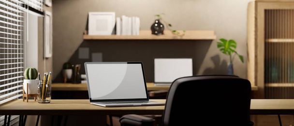 ノートパソコンのホワイトスクリーンモックアップ、文房具や木製のテーブルの上の装飾と現代的なオフィスの共同作業スペースのインテリアデザイン。3Dレンダリング、 3Dイラスト - 写真・画像