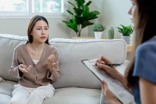 Women have mental symptoms illnesses and depression. meet psychiatrist to treat his illness. Female psychotherapy treatment support. - Photo, Image