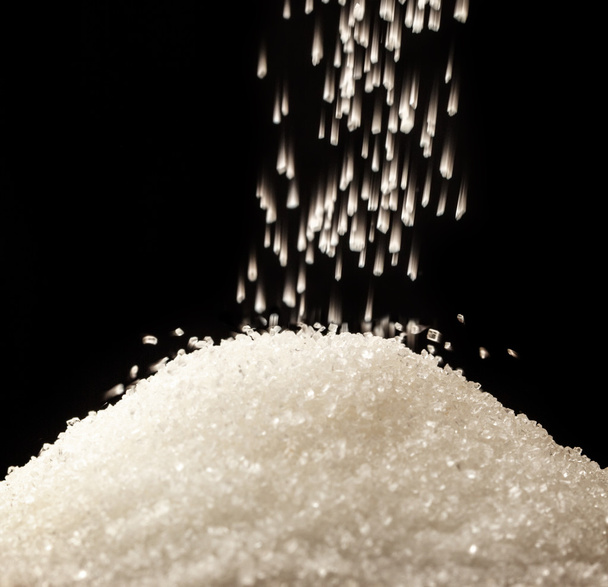 白い砂糖の流れ - 写真・画像