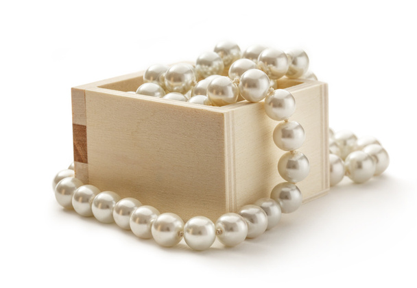 Poitrine avec collier de perles
 - Photo, image