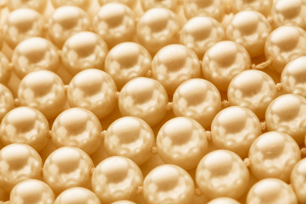 Yellow pearls background - Photo, Image