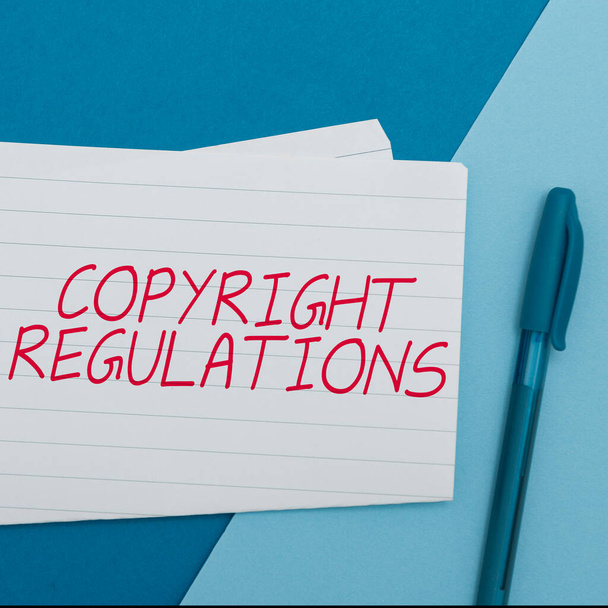 Writing displaying text Copyright Regulations, Concept meaning body of law that governs the original works of authorship - Photo, image