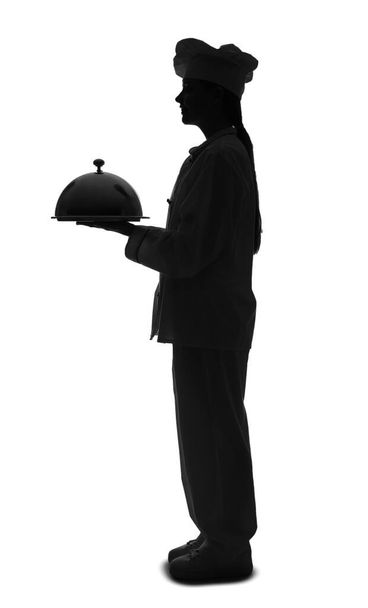 Silhouette of female chef with cloche on white background - Fotoğraf, Görsel