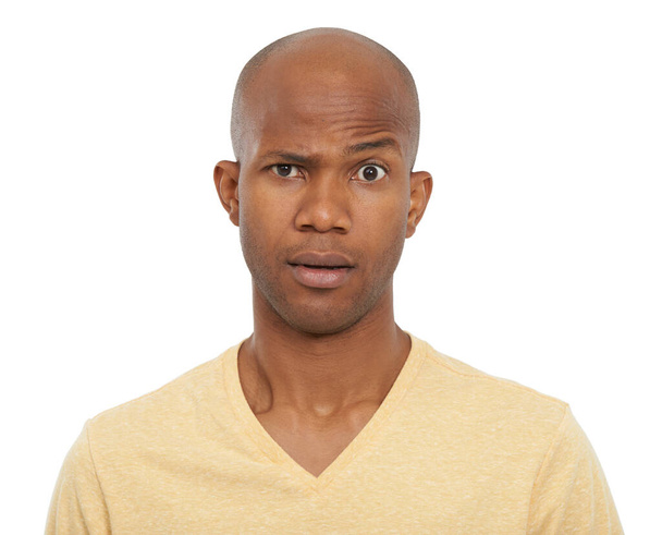 Huh. A young african-american man looking at the camera with his one eyebrow raised - Photo, Image