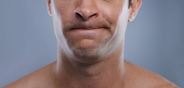 So close...Cropped studio shot of the lower half of a young mans face - Foto, Imagem