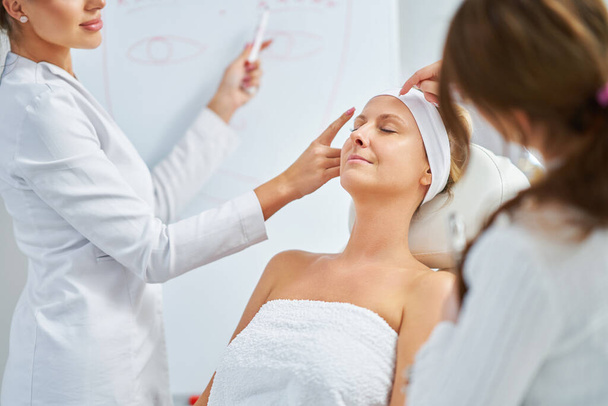 A scene of cosmetology training in a beauty salon. High quality photo - Fotó, kép