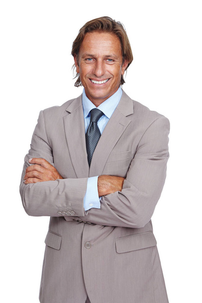 Business man, portrait and ceo, arms crossed and smile for success in leadership, executive isolated on white background. Businessman, corporate manager and motivation, vision and professional goals. - Fotó, kép