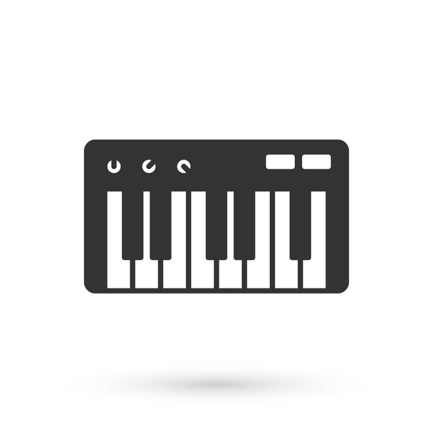 Иконка синтезатора Grey Music выделена на белом фоне. Электронное пианино Вектор - Вектор,изображение