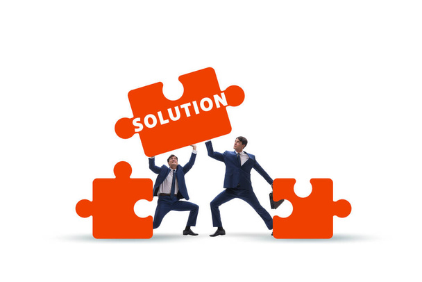 Business solution concept with the jigsaw puzzle pieces - Foto, Bild