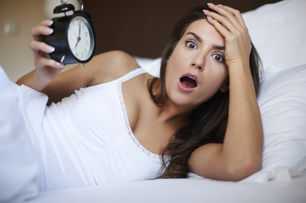 Woman in bed with alarm - Photo, Image