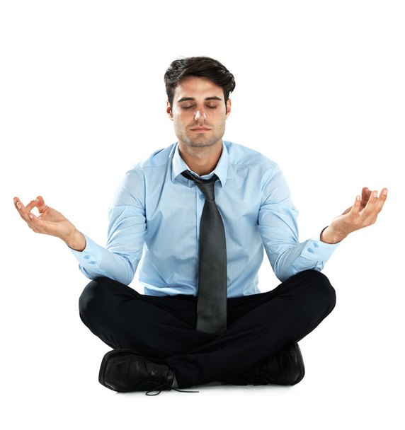 Yoga meditation, relax and businessman meditate for work stress relief, spiritual mental health or chakra energy healing. Lotus, zen mindset peace and employee mindfulness on white background studio. - Photo, image