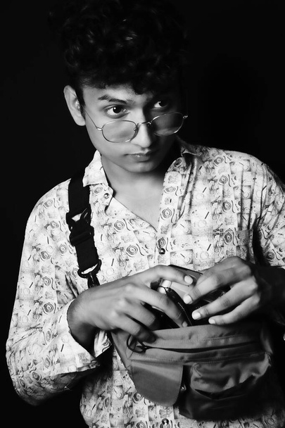 smart young boy , wearing glass ,black and white image - Foto, afbeelding