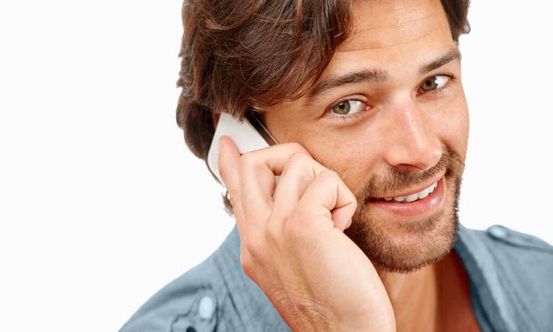 Phone call, communication and face portrait of man talking, speaking or studio chat to digital mobile contact. Smartphone user, conversation discussion and happy model networking on white background. - Photo, Image