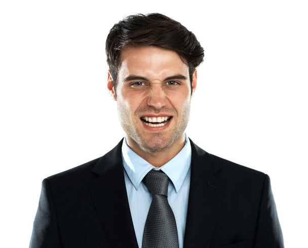 Portrait of angry man gritting teeth in business suit, frustrated and isolated on white background. Stock market crash, economy and ceo businessman annoyed with economy and financial status in studio. - Foto, immagini