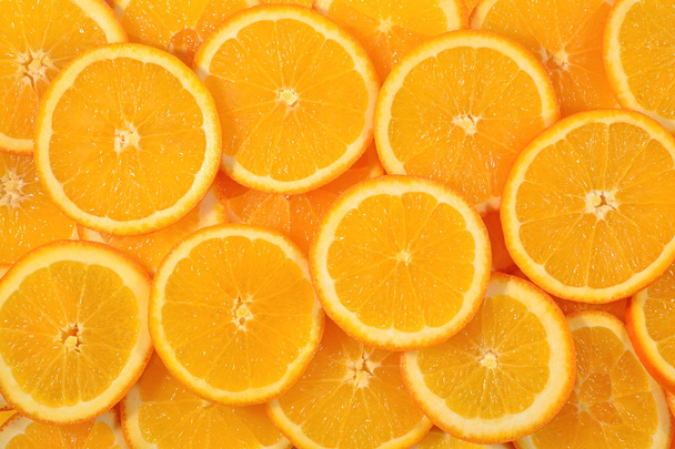 オレンジ スライスの背景  - 写真・画像