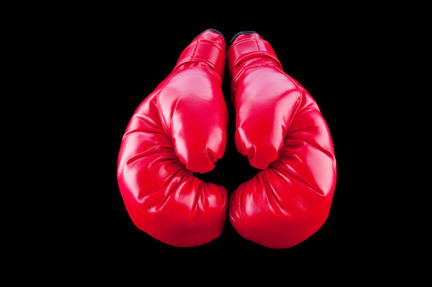 Red boxing gloves isolated on black - Photo, Image