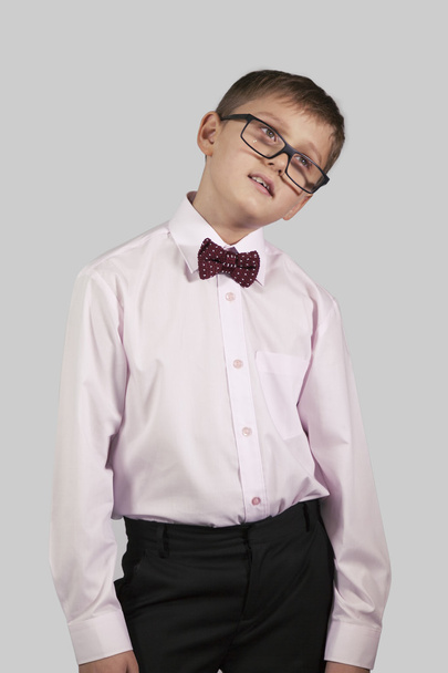 half-length portrait boy in bow tie and glasses - Foto, imagen