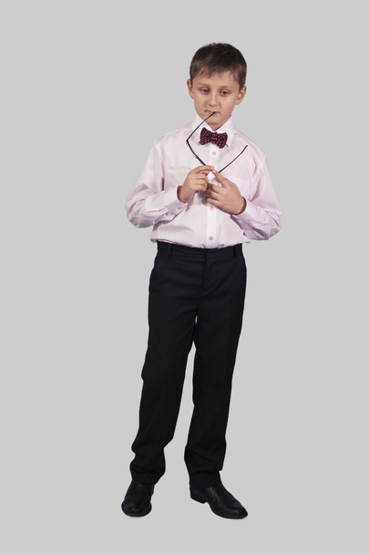 growth portrait boy in bow tie that keeps the mouth shackle poin - Photo, Image