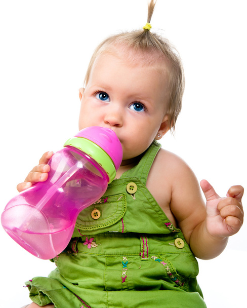Little girl with the bottle of water - Fotó, kép