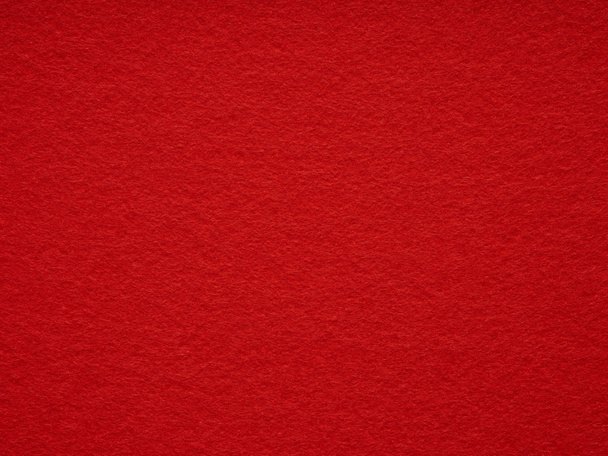 Red felt texture. Saturated background for Christmas desktop, holiday New Year, xmas seasonal decoration, valentin day, text, lettering, patchwork or, party greeting and wedding card element. - Photo, Image