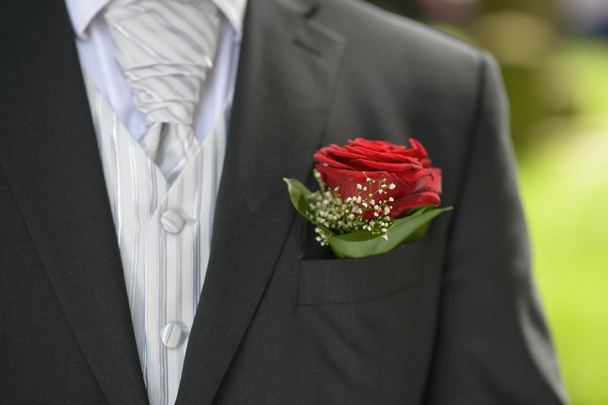 Blume in der Tasche des Anzugs - Foto, Bild