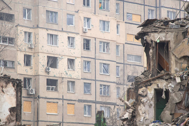 A house blown up by a Russian rocket in the city of Dnipro on Pobeda Street in Ukraine, War in Ukraine, a rocket attack on civilians in their homes - Fotografie, Obrázek