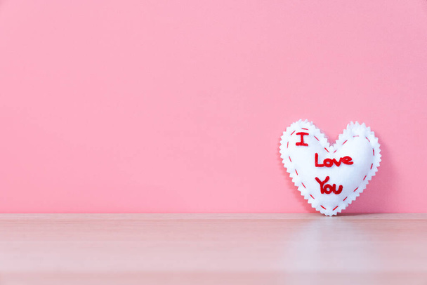 I Love You sewn valentines heart on pink background - Fotografie, Obrázek