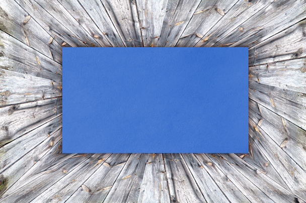Blue Paper on wood background or texture - Foto, imagen