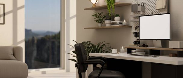 side view of a modern urban home office interior design with PC desktop computer mockup and accessories on table, armchair, houseplant, wall shelf and decor. 3d render, 3d illustration - Photo, image
