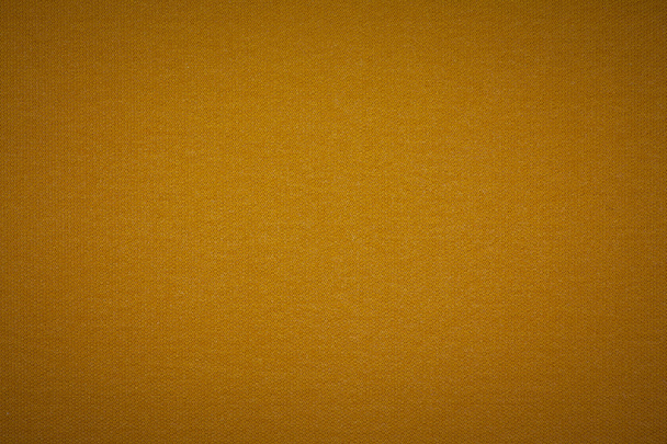 Background texture of dark orange fabric closeup with vignette - Photo, Image