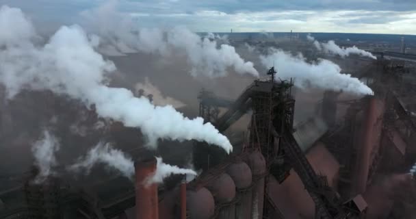 Aerial view. Emission to atmosphere from industrial pipes. Smokestack pipes shooted with drone. High quality 4k footage - Video