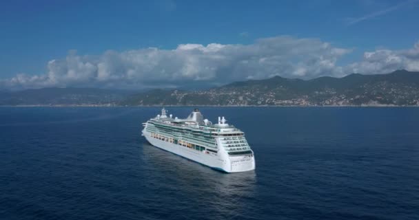 Travel on a cruise comfortable liner on the blue deep ocean in the summer. Drone shot of large luxury cruise ship sailing on Pacific Ocean. High quality 4k footage - Video