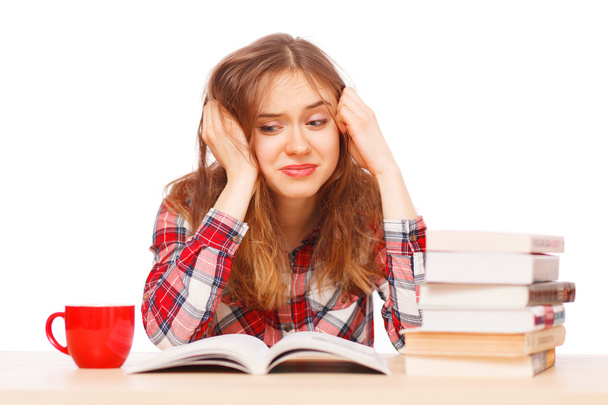 Chica joven estresada por sus libros de texto
 - Foto, imagen
