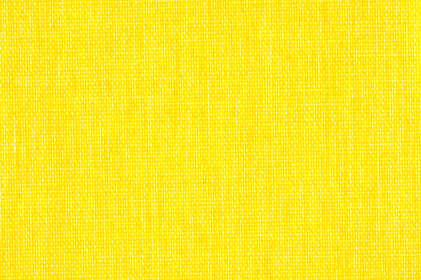 Background texture of bright yellow fabric closeup - 写真・画像