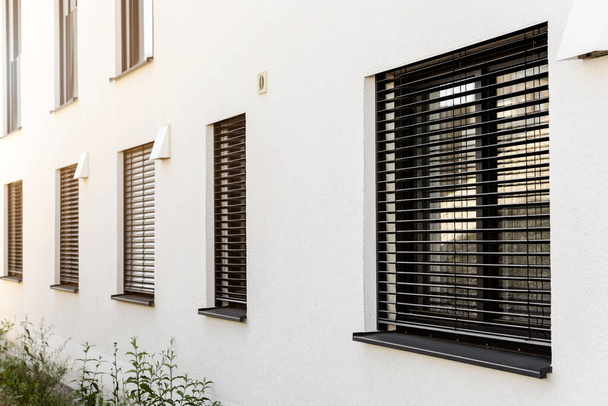 Roller Blinds on Windows of Modern House. Window with Shutter Outside.  - Photo, image