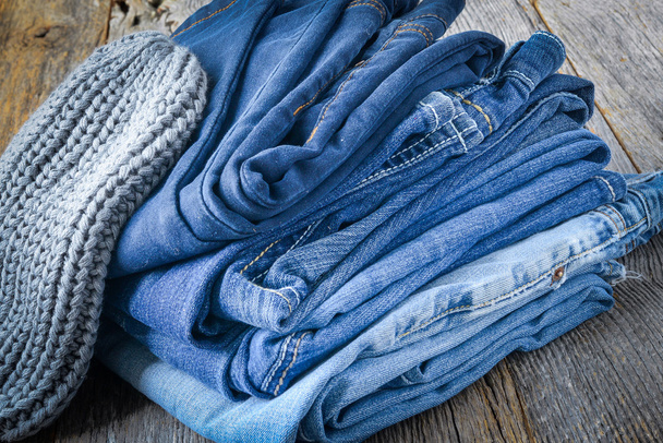 Denim Jeans on Wood Background - Photo, Image