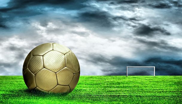 Soccer ball on green grass and sky background - Фото, зображення