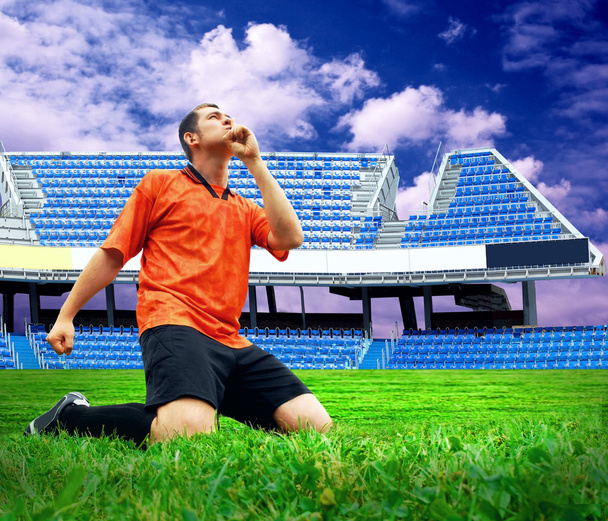 Happiness football player after goal on the field of stadium und - Foto, imagen