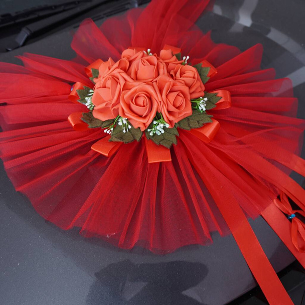 Ribbon Decoration. Several kinds of ribbon decorations prepared for the opening ceremony of a car showroom. - Foto, imagen