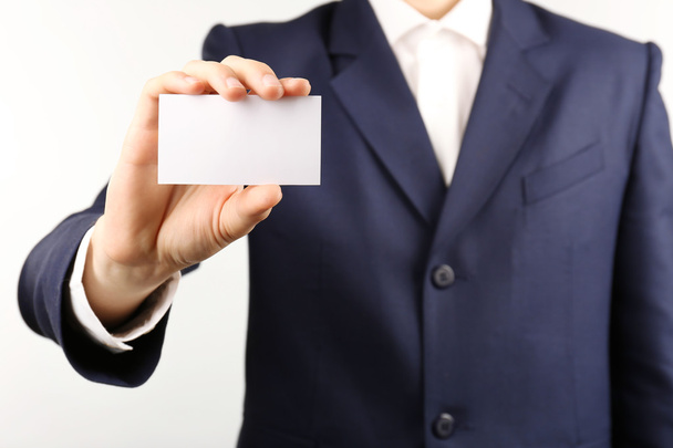Businessman with business card - Zdjęcie, obraz