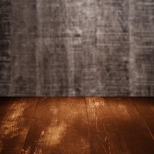 Table with wooden wall - Фото, зображення