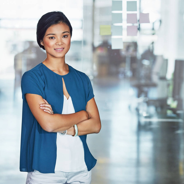 Portrait, Asian woman and arms crossed for corporate success, leadership and confidence for advertising agency, goals or target. Female entrepreneur, employee and leader with business idea and office. - Foto, Imagen