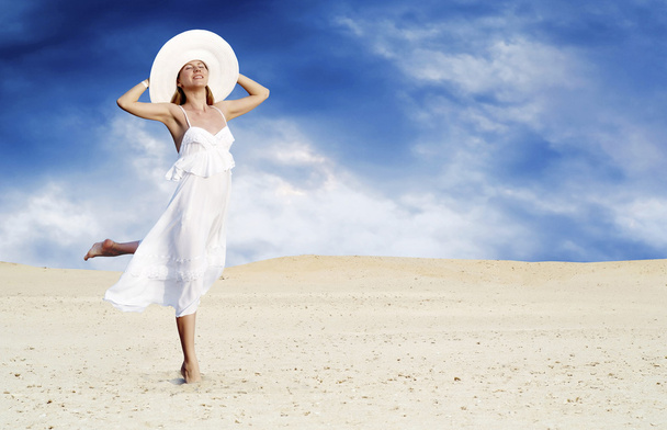 Young beautiful women in white, relaxation at sunny desert - Photo, Image