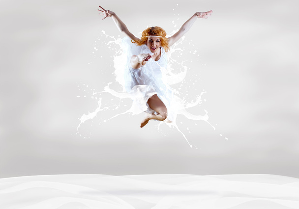Jump of ballerina with dress of milk - Φωτογραφία, εικόνα